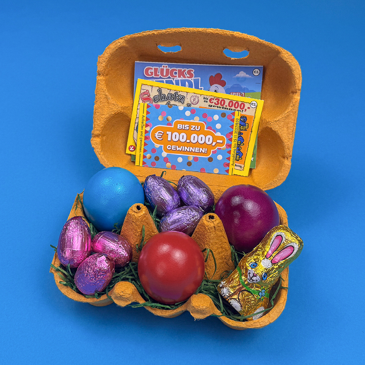 Ein Bild, dass die fertige Oster-Überraschung mit Eierkarton im geöffneten Zustand zeigt. 