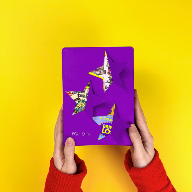 Ein Bild, dass das fertige Sterne Packerl mit Rubbellosen zeigt.